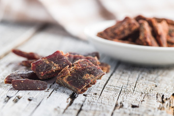 Beef jerky pieces.