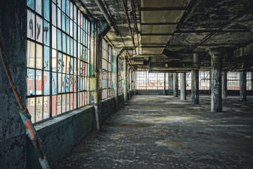 Interior view of the abandoned Fisher Body Plant factory in Detroit. The plant is abandoned and...