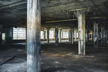 Interior view of the abandoned Fisher Body Plant factory in Detroit. The plant is abandoned and vacant ever since.