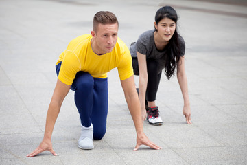 Young couple sport runner prepare for run outdoors