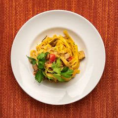fettuccine with porcini mushrooms and Pagnino tomatoes from top