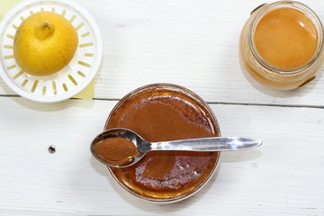 Cellulite treatment from honey, cinnamon and lemon. Ingredients for homemade anti cellulite wrap, flat lay