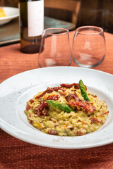 risotto with dried tomatoes, asparagus and bacon