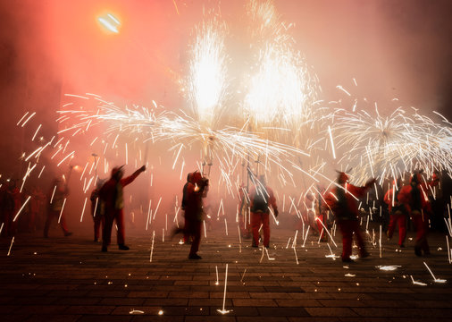 Typical Correfocs of Catalonia, a type of fireworks managed by men dressed as devils