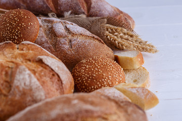 Freshly Baked Homemade Bread, close-up, isolated on a white background.