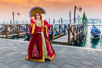 Venice, Italy. Carnival of Venice, beautiful mask at St. Mark's Square.