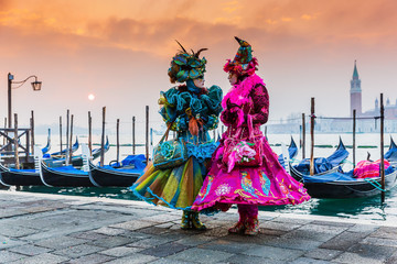 Naklejka na ściany i meble Venice, Italy. Carnival of Venice, beautiful masks at St. Mark's Square.