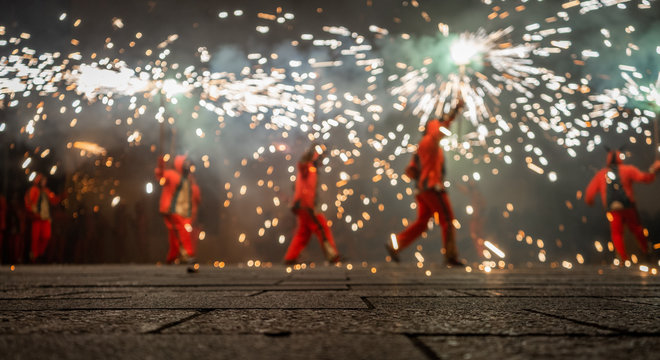 Typical Correfocs of Catalonia, a type of fireworks managed by men dressed as devils