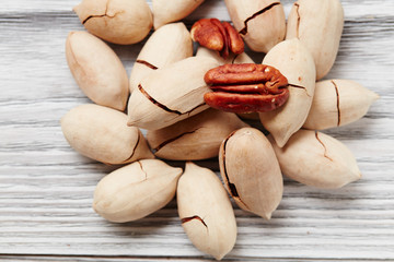 Pecans on a wooden table