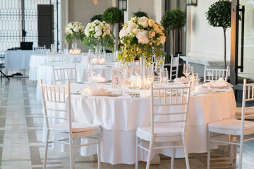 restaurant terrace prepared for a wedding dinner