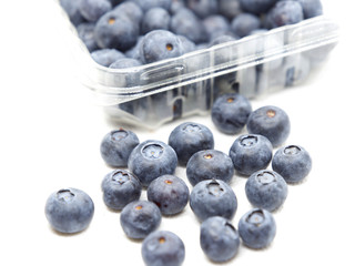 Fresh blue berries isolated on white background