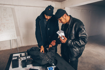 Men in black counting money