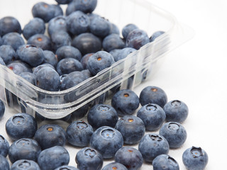 Fresh blue berries isolated on white background