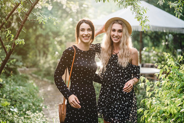 Two girls in a summer park