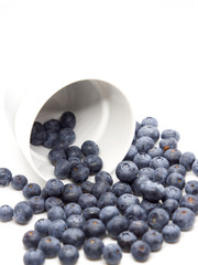 Fresh blue berries isolated on white background