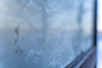 Closeup Photo of Details in Hoarfrost on Window on a Sunny Winter Day - Abstract Background