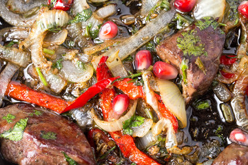 Fried chicken livers with onions.