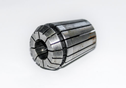 A chuck spring collet for milling machine with the rust stains with selective focus isolated on white
