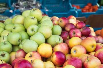 fresh red  and green apples in a market