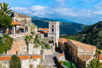 Fototapeta na wymiar Cityview of the Savoca village in Sicily, Italy. The town was the location for the scenes set in Corleone of Francis Ford Coppola's The Godfather