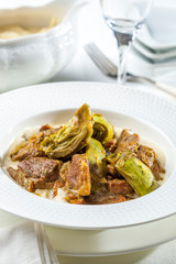 Lamb served with artichokes