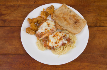 Chicken Parmigiana and Shrimp Scampi Fritta with Garlic Toast and Spaghetti