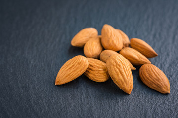Almond nut concept healthy snack closeup.
