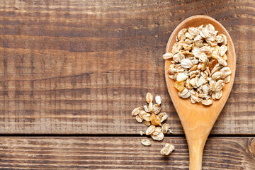 Wooden background with organic food. Top view.
