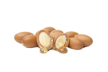 ARGAN SEEDS isolated on a white background. Argan oil and argan nuts concept