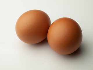 Two eggs isolated on white background