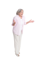 happy senior woman posing on white background
