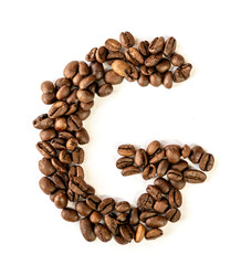 G letter made from coffee beans isolated on white background