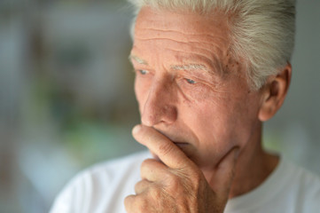Close up portrait of Sad senior man