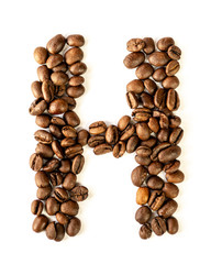 H letter made from coffee beans isolated on white background
