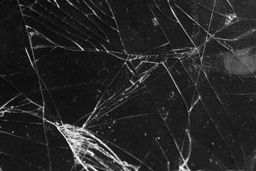 Broken glass on a black background, object background design texture