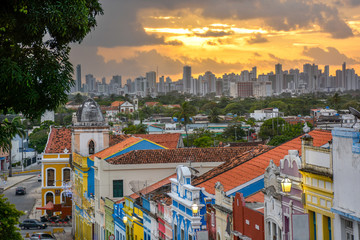 The historic architecture of Olinda in Pernambuco, Brazil with its colonial buildings and cobblestone streets at sunset. - obrazy, fototapety, plakaty
