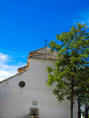Fototapeta na wymiar White church in Albaicin distric, Granada, Spain, Andalusia.