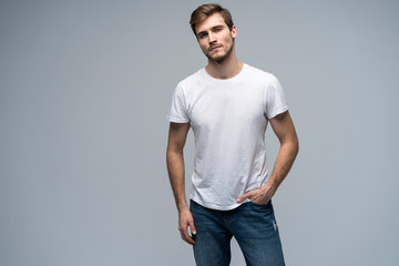 Handsome young guy posing in studio - isolated