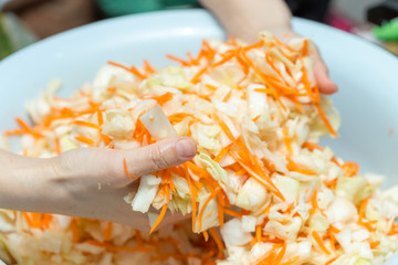 Cooking cabbage and hands