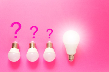 light bulbs on pink background, concept of new idea, symbol of idea