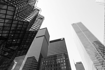 Obraz na płótnie Canvas skyscrapers in Toronto looking up at the sky