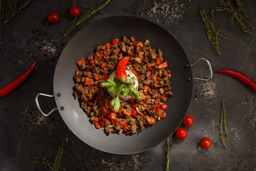 Sausage with sliced meat and vegetables