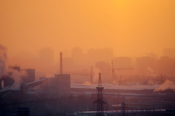 Fototapeta premium dawn in the city in the winter among high-rise buildings