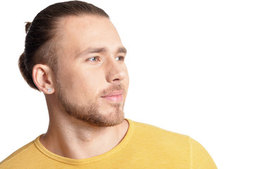 Obraz premium Portrait of young man posing on white background