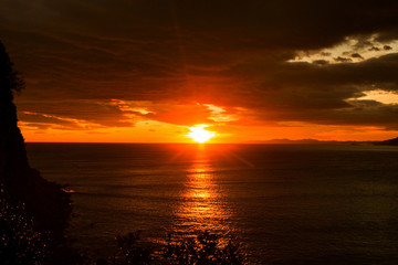 Fototapeta na wymiar Dramatic coastal sunrise scene in Santona, North Spain