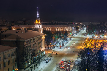 Fototapeta premium Night Voronezh downtown in winter, aerial summer cityscape from rooftop