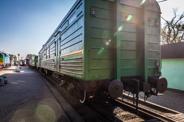 old locomotive stands on the platform of the station.