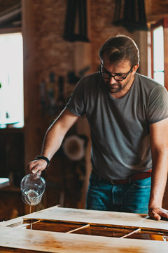 Portrait of Artisan Carpenter Working in his Workshop
