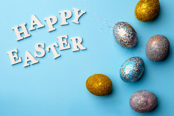 Lettering Happy Easter with eggs