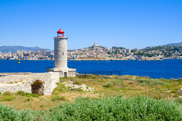 Fototapeta na wymiar Chateau d'If, Lighthouse on coast of the island and a beautiful panoramic view of Marseille.. Castle If.